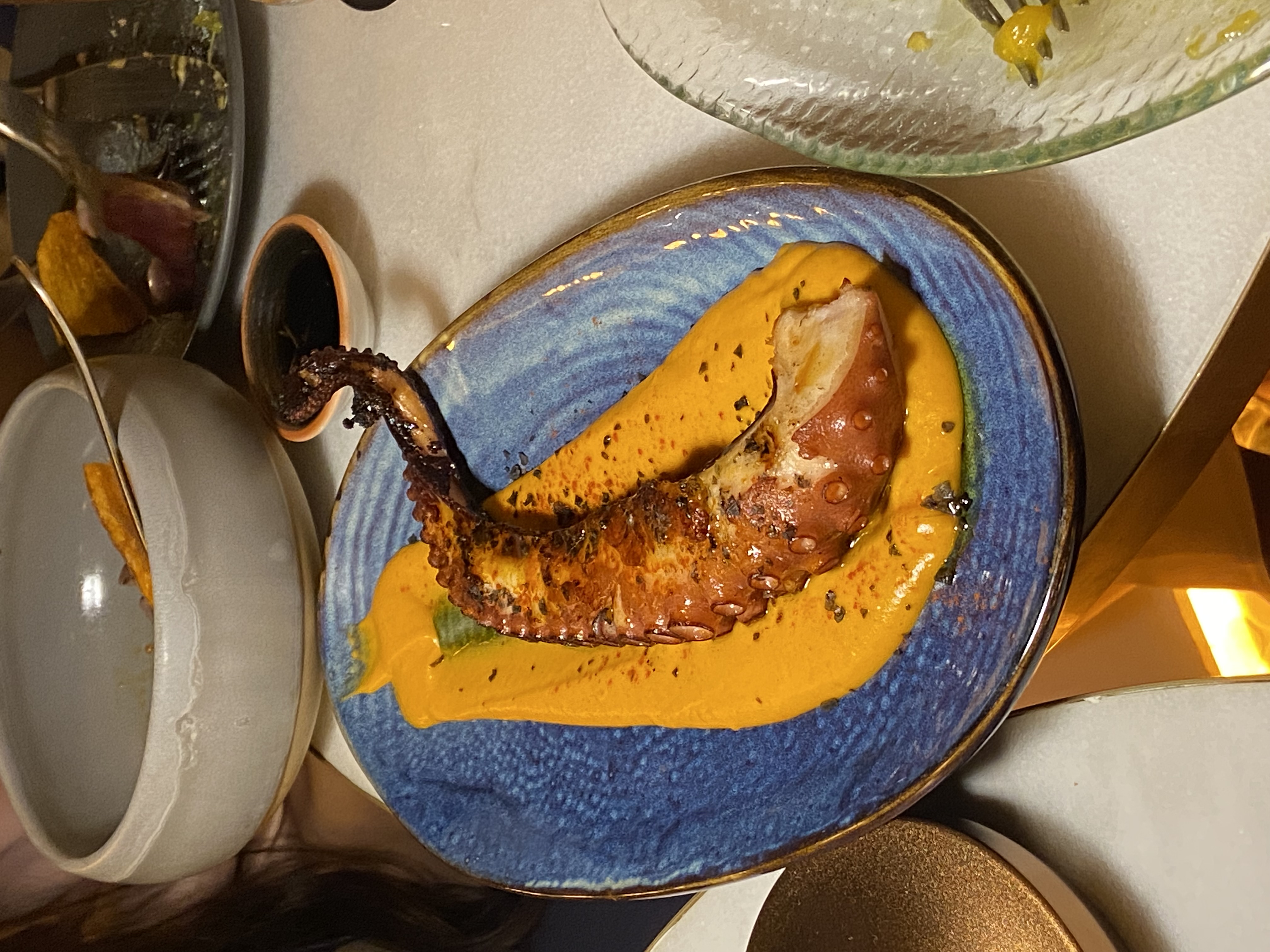 Málaga at night, city lights along the coast and harbour