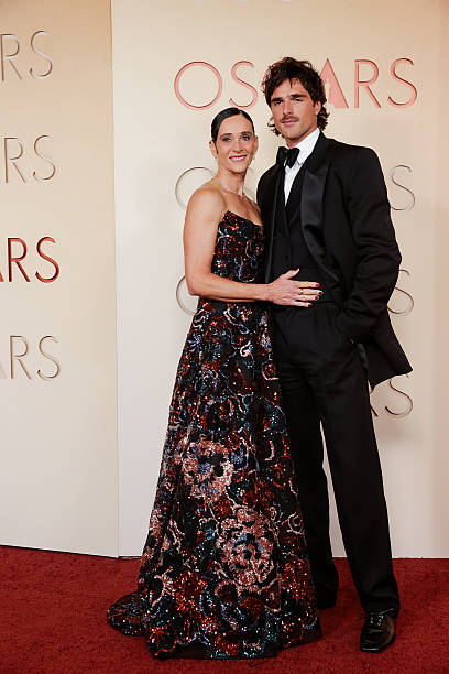 Jacob Elordi with his mother on the Oscars red carpet wearing Bottega Veneta